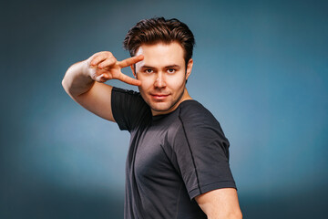 Poster - Young brunette handsome man posing