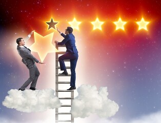 Wall Mural - Businessman reaching out for stars