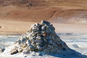 Hverir geothermal area in Iceland. Popular tourist area with mud pots and smoking vents.