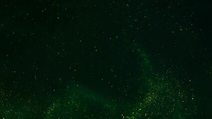 Wall Mural - beautiful spiral splashes of golden dust particles in green liquid. abstract floating gold glitterin