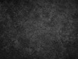 © Nattawut - Dark cement wall background in vintage style for graphic design or wallpaper
