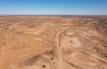 Canvas Print - driving through the outback desert country of Australia.