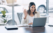 © Rene La/peopleimages.com - Woman, wave or video call on laptop conference, lawyer training workshop or virtual consulting appointment. Smile, happy or attorney on technology webinar and hello or greeting hands in legal office