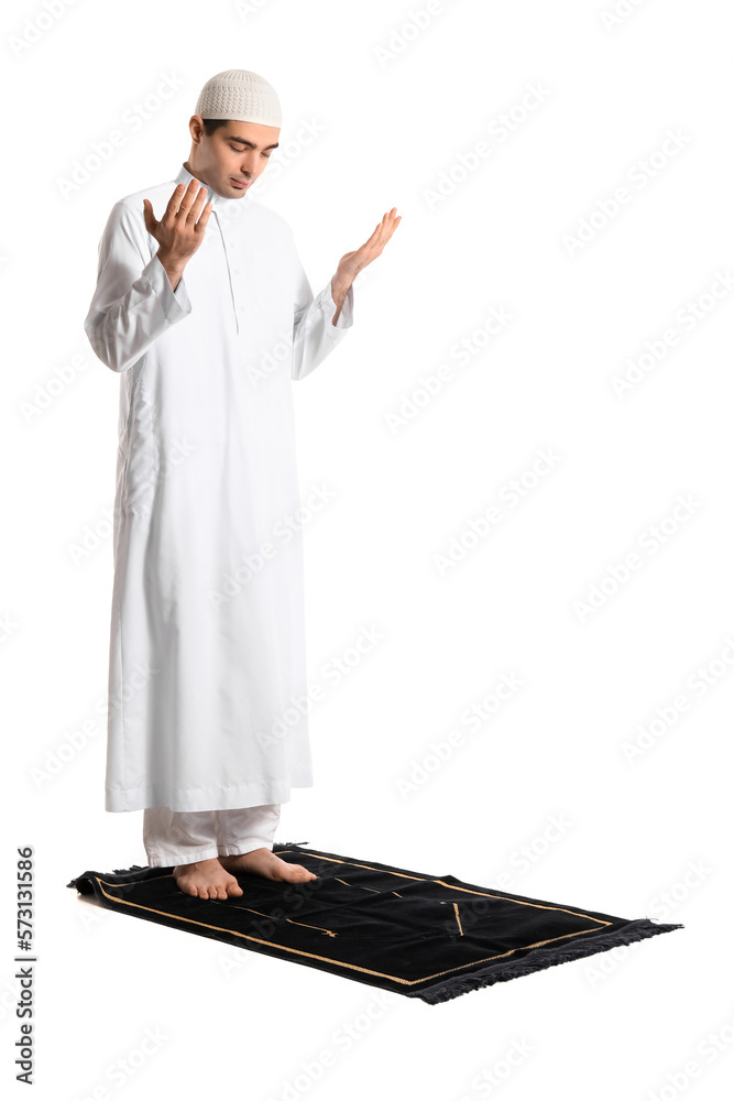 Praying Muslim man on white background