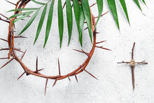 Crown Of Thorns With Wooden Cross And Palm Leaf On White Background. Good Friday Concept