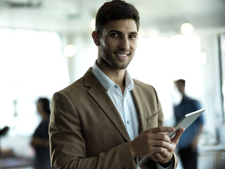 Fototapete - Technology, smile and portrait of businessman with tablet for email, sales report or online schedule in office. Research, leadership and ceo networking, online communication in management at startup.