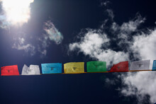 Prayer Flags Waving In The Wind Against The Tibetan Sky