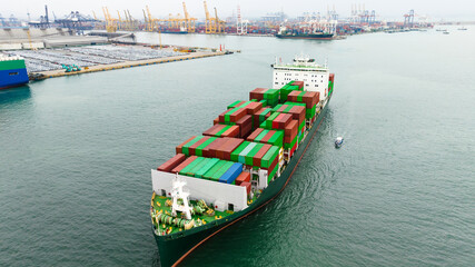 aerial view cargo container ship sailing in sea to import export goods transportation and commercial port background..