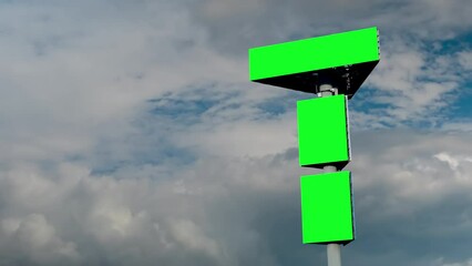 Wall Mural - three blank green billboards or large displays and moving white clouds against blue sky - timelapse.