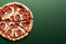 A Pizza With Pepperoni And Basil On A Table Top With A Brown Background And A Black Border Around The Edges Of The Pizza Is Drizzled With Red Sauce And Green Leaves. Generative Ai