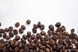 © Kwangmoozaa - Fresh roasted brown coffee beans on white background