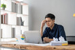 © wichayada - Mad crazy man employee sitting in office workplace with sticky notes all around, shouting furious angry, pissed off deadline and stressful job at office