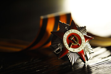 Patriotic War Order and battle order for courage and bravery on George Ribbon background for the great day of Victory (russian text: Patriotic War)