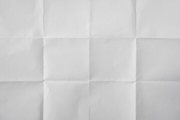 white paper folded four times background