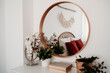 © Westend61 - Mirror on wall with decoration in bedroom at home