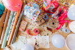 © Westend61 - Various gift wrapping material and party decoration on desk
