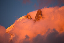 Pink Evening Light (Alpenglow) On The Famous Drus Mountain, As Seen From Chamonix.