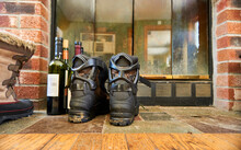 Cross Country Ski Boots By The Fireplace, Braintree, Vermont, USA