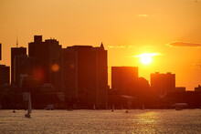 Boston Skyline At Sunset From Boston Harbor, Massachusetts, USA