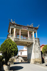 Wall Mural - Building view of Meinong East Gate Tower in Kaohsiung, Taiwan. The tower was constructed with Qing Dynasty architecture.