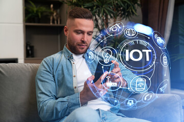 Poster - Young man with phone and IOT sphere, smart devices and connectiv
