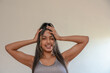 © rushay - Portrait of young woman who is sticking her tongue out