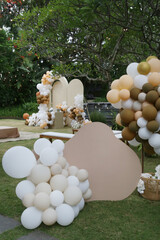 Wall Mural - creative gender neutral baby shower or birthday decoration in the garden. bohemian style outdoor eve