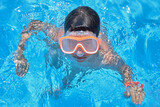 Fototapeta  - Portrait of a young boy  swimming goggles fogged up