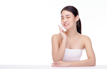 attractive beauty young asian woman cleaning her face with a cotton pad isolated over white backgrou