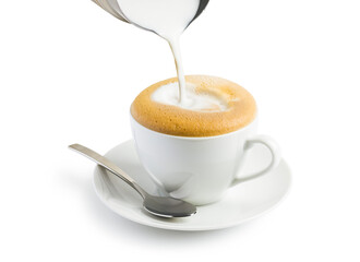 Sticker - Making cappuccino with milk frother on white background.