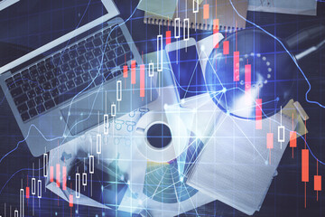 Poster - Financial market graph and top view computer on the desktop background. Multi exposure. Investment concept.