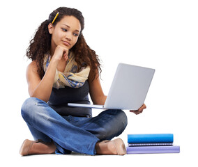 A Hispanic young college student looking at a laptop and reading e-books for university education and making internet research and online notes on a tech device isolated on a png background.