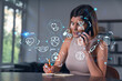 © VideoFlow - Smiling businesswoman in casual wear holding using smartphone typing at office workplace with notebook. Concept of distant work, business education. Medical healthcare icons hologram