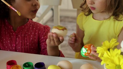 Wall Mural - children make their own hand-painted eggs for the feast of Holy Easter.