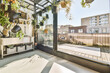 © ADDICTIVE STOCK - Terrace of modern apartment in sunlight