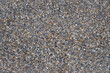 Colored gravel in a concrete slab as a background photo.