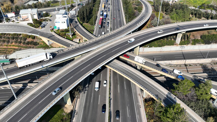 Wall Mural - Aerial drone photo of modern Attiki Odos toll road interchange with National road in Attica, Athens, Greece