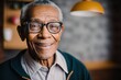 Aged well: close-up portrait of happy senior BIPOC man looking at camera. Nice bokeh background.