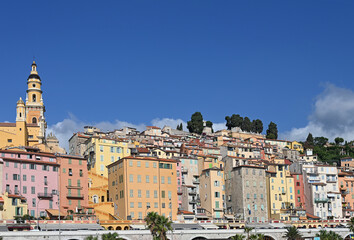 Canvas Print - Church tower and colorful old buildings in Menton France summer season