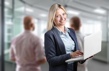 Poster - Happy business woman working in office