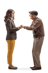 Sticker - Full length profile shot of a young woman holding hands of an elderly man