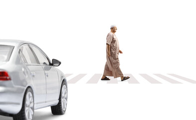 Wall Mural - Vehicle and a mature arab man in ethinc clothes walking on a pedestrian crossing