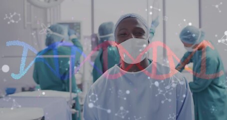 Poster - Animation of dna strand and molecules over smiling african american male surgeon in theatre