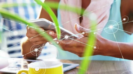 Poster - Animation of network of connections over mid section of woman using smartphone at a cafe