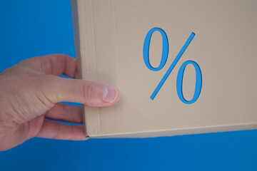 Poster - Percentage Sign with cardboard box. Brown folded card box.