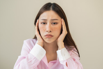 Dermatology, expression face worry, stressed asian young woman hand touching facial at dark spot of melasma, freckles from pigment melanin, allergy sun. Beauty care, skin problem treatment, skincare.