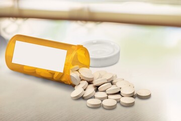 Medical pills in prescription drug plastic bottle