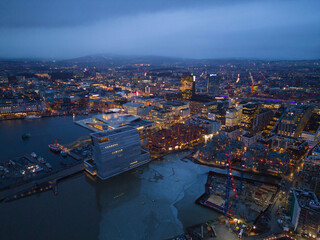 Wall Mural - Aerial view of Oslo Downtown Skyline, Norway. Financial district and business centers in smart urban city in Europe. Skyscraper and high-rise buildings at night.