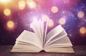 Poster - Open old Book with magic glowing light