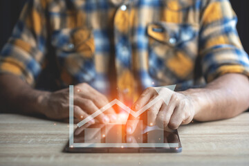 Businessman working with tablet in the office. People using digital tablet on the table and showing smart interface icons. New technology for business concept.